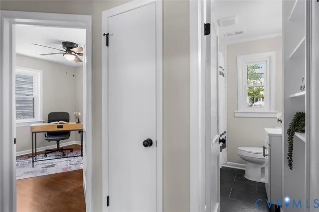 a view of bathroom with a toilet