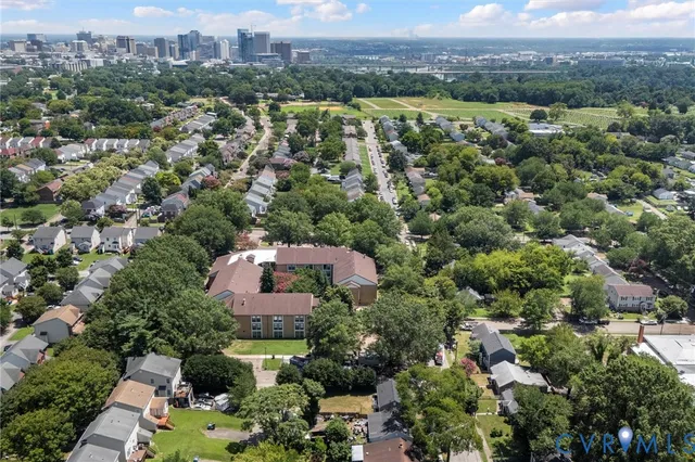 an aerial view of a city with lots of residential buildings