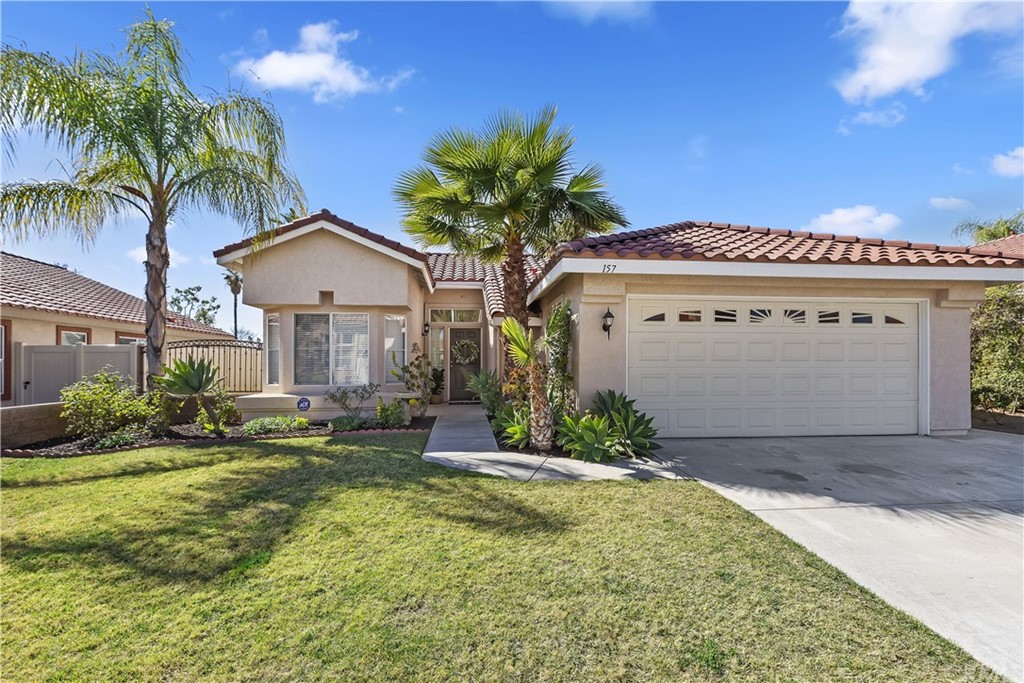 157 Cape Elizabeth Way Riverside, CA 92506 - Photo 1 of 1 a front view of a house with a yard
