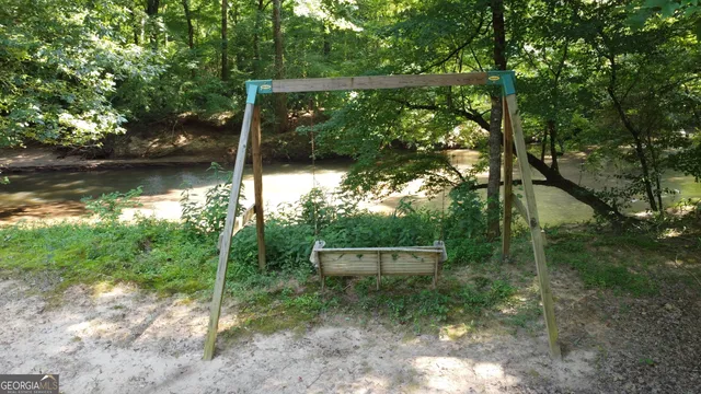 a view of water with a tree