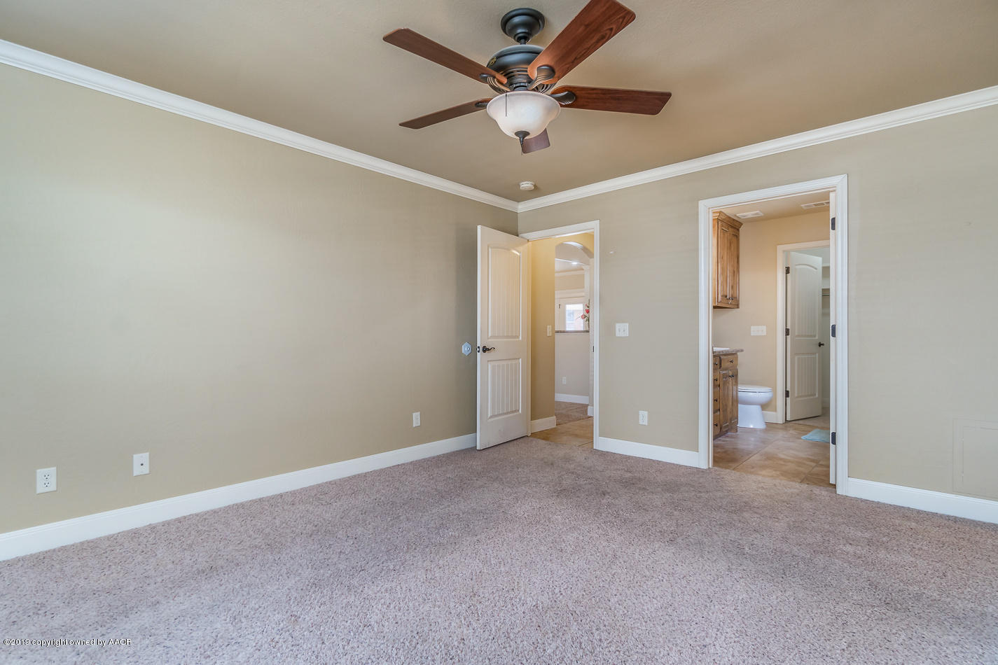 9203 Orry Avenue Amarillo, TX 79119 - Photo 11 of 22 an empty room with fan and a ceiling fan