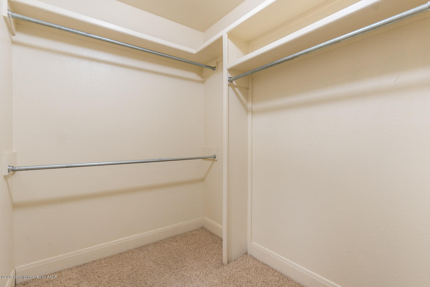 9203 Orry Avenue Amarillo, TX 79119 - Photo 14 of 22 a view of an empty walk in closet