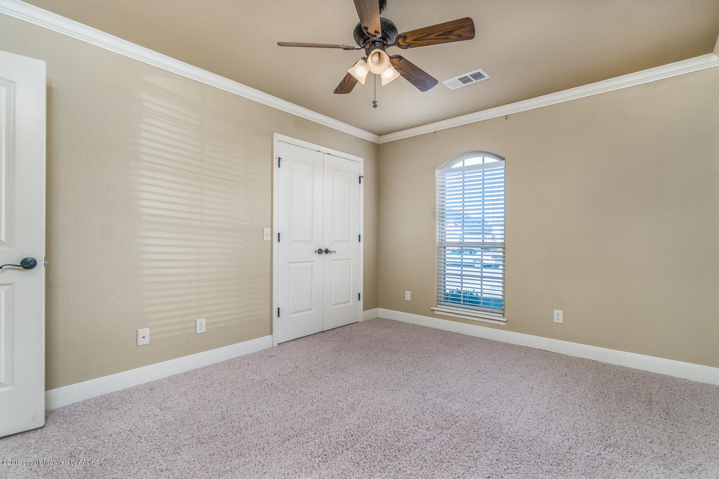 9203 Orry Avenue Amarillo, TX 79119 - Photo 15 of 22 a view of an empty room with a window