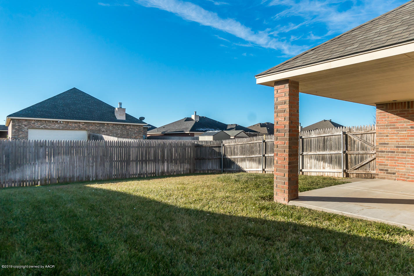 9203 Orry Avenue Amarillo, TX 79119 - Photo 20 of 22 a view of a back yard of the house