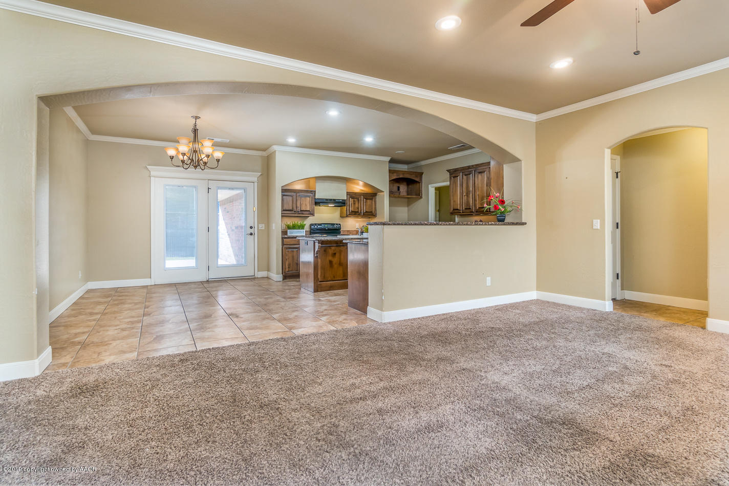 9203 Orry Avenue Amarillo, TX 79119 - Photo 4 of 22 a view of a kitchen with a sink and cabinets