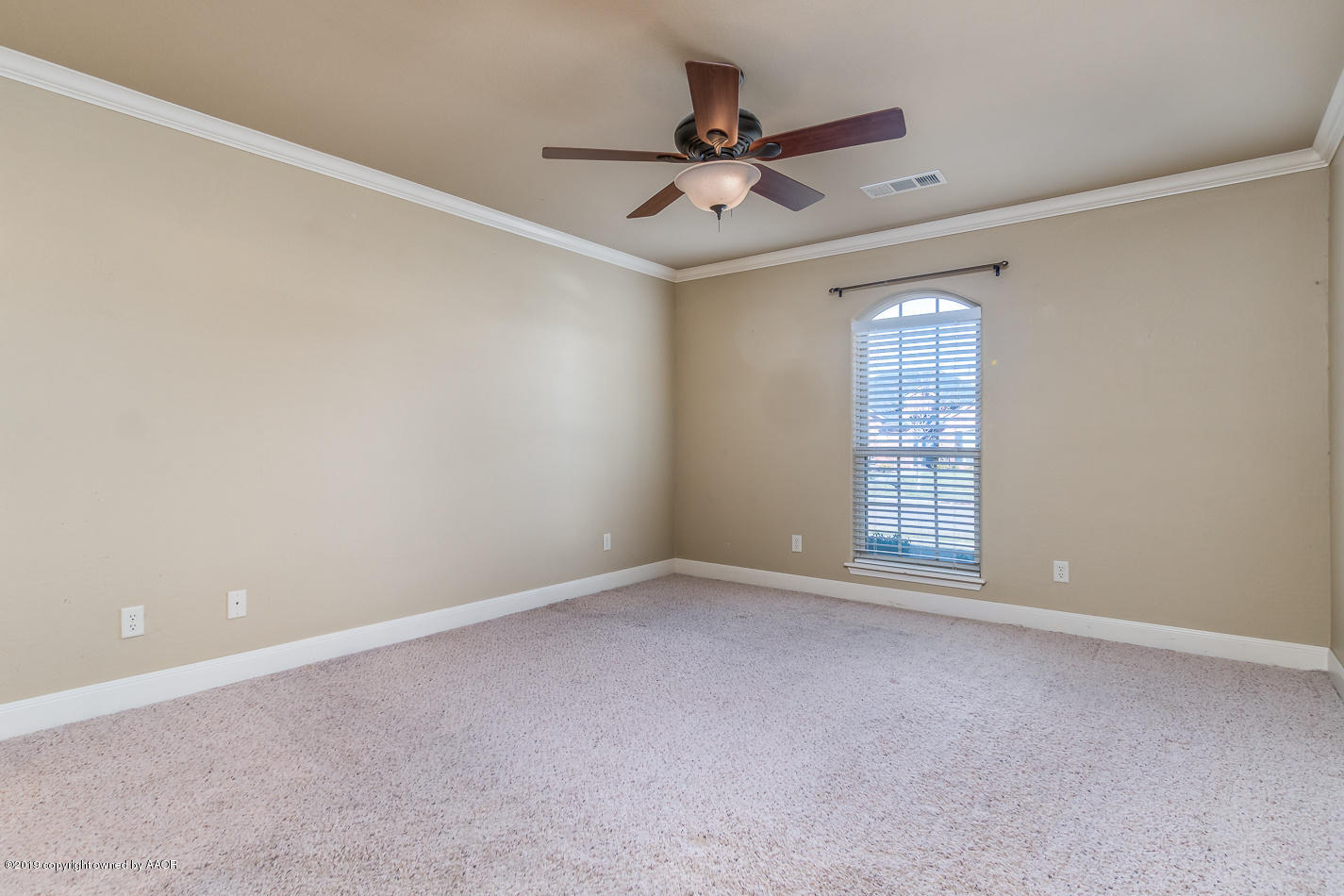 9203 Orry Avenue Amarillo, TX 79119 - Photo 10 of 22 a view of an empty room with a window
