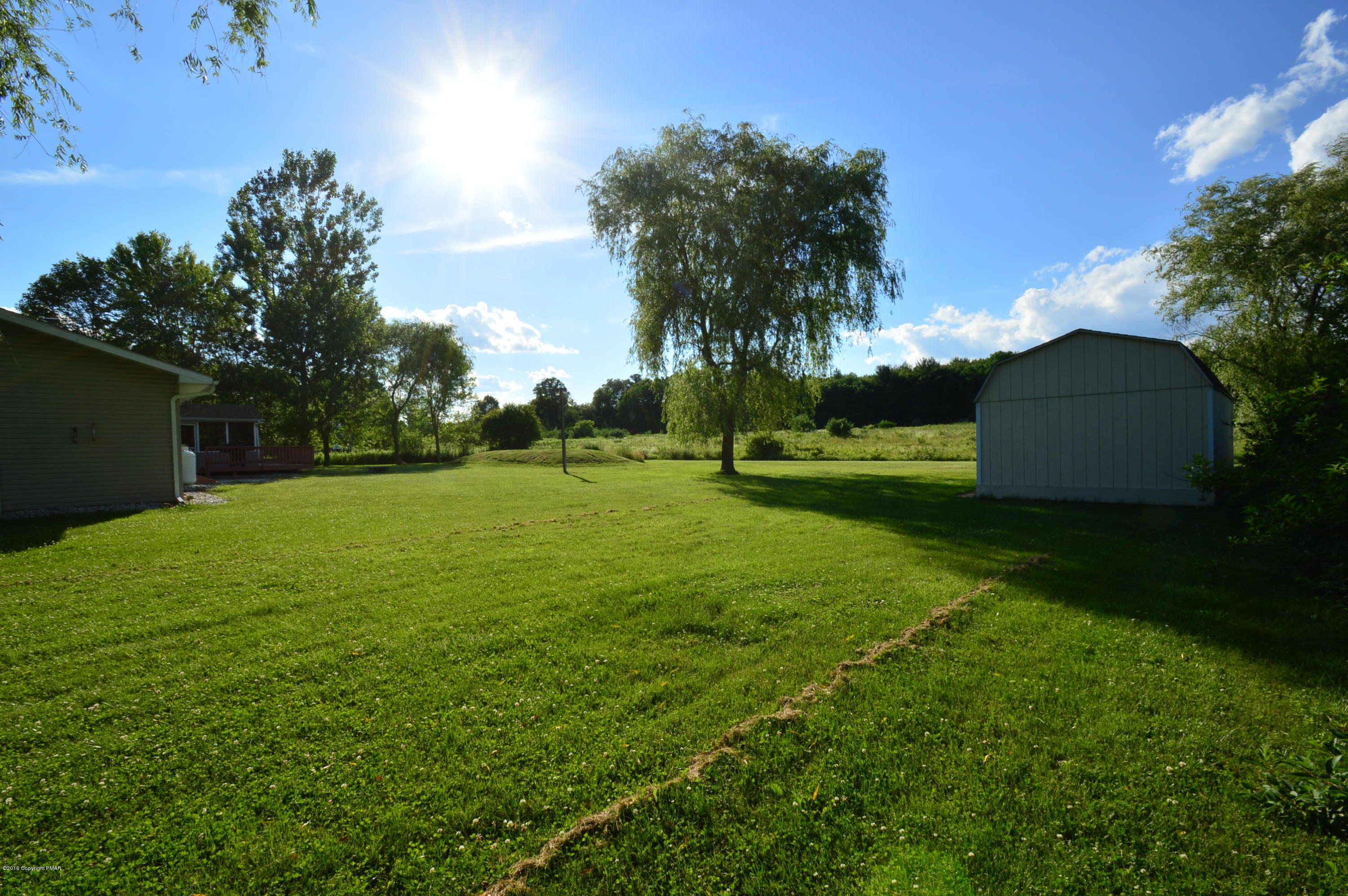 1109 Interchange Road Kunkletown, PA 18058 - Photo 18 of 23 a view of a golf course with a garden