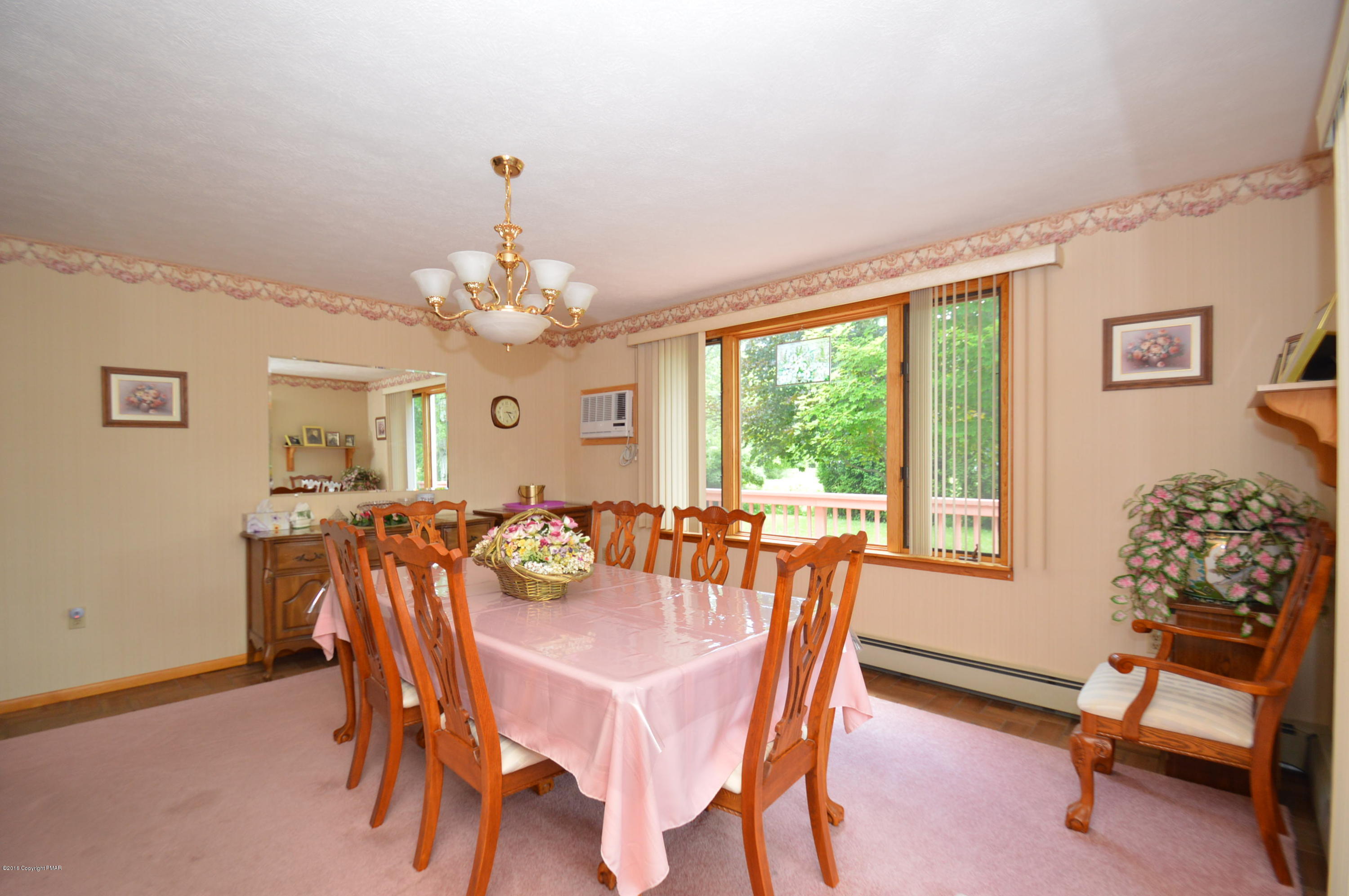 1109 Interchange Road Kunkletown, PA 18058 - Photo 7 of 23 a view of a dining room with furniture window and outside view