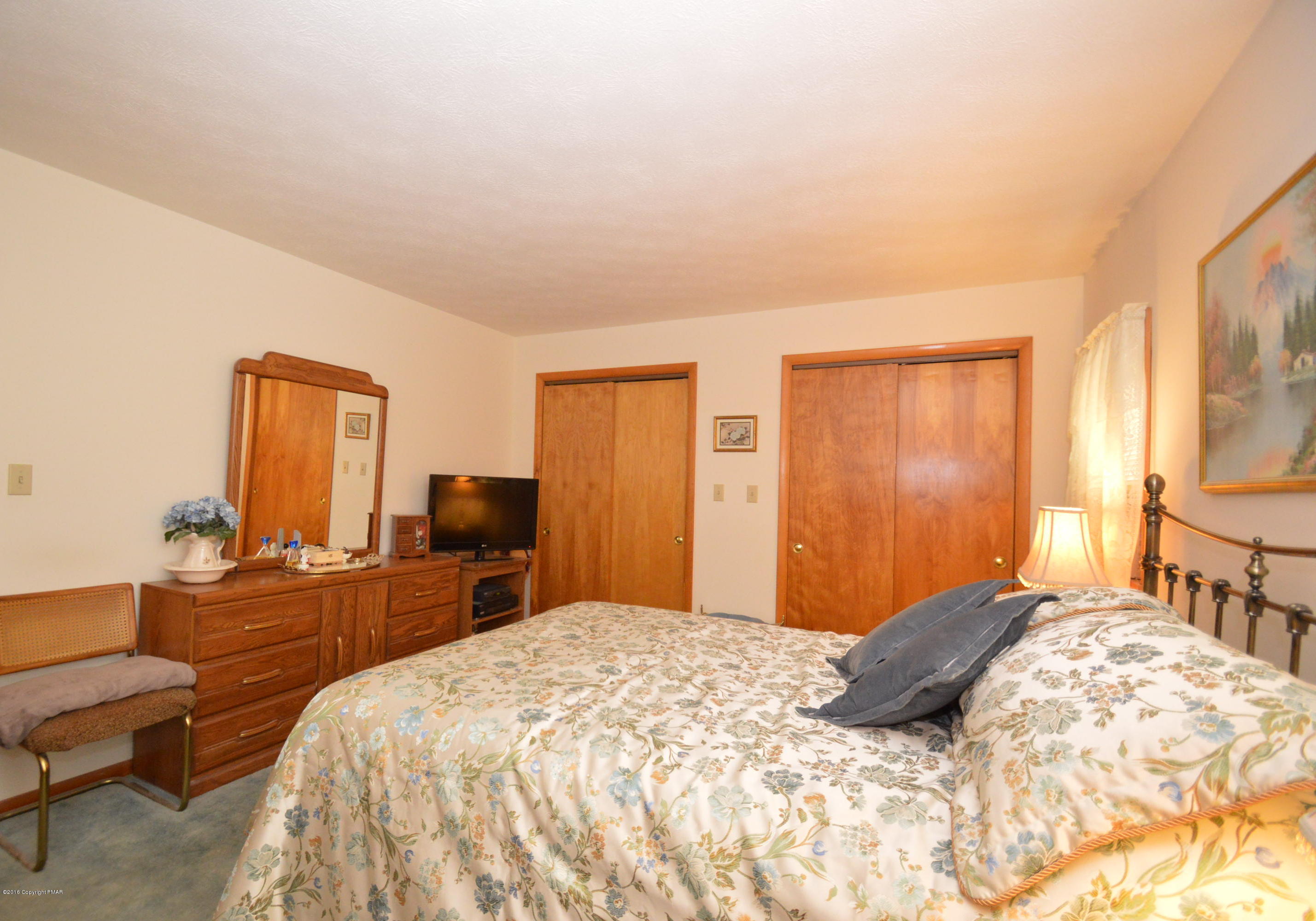 1109 Interchange Road Kunkletown, PA 18058 - Photo 8 of 23 a bedroom with a bed and wooden floor