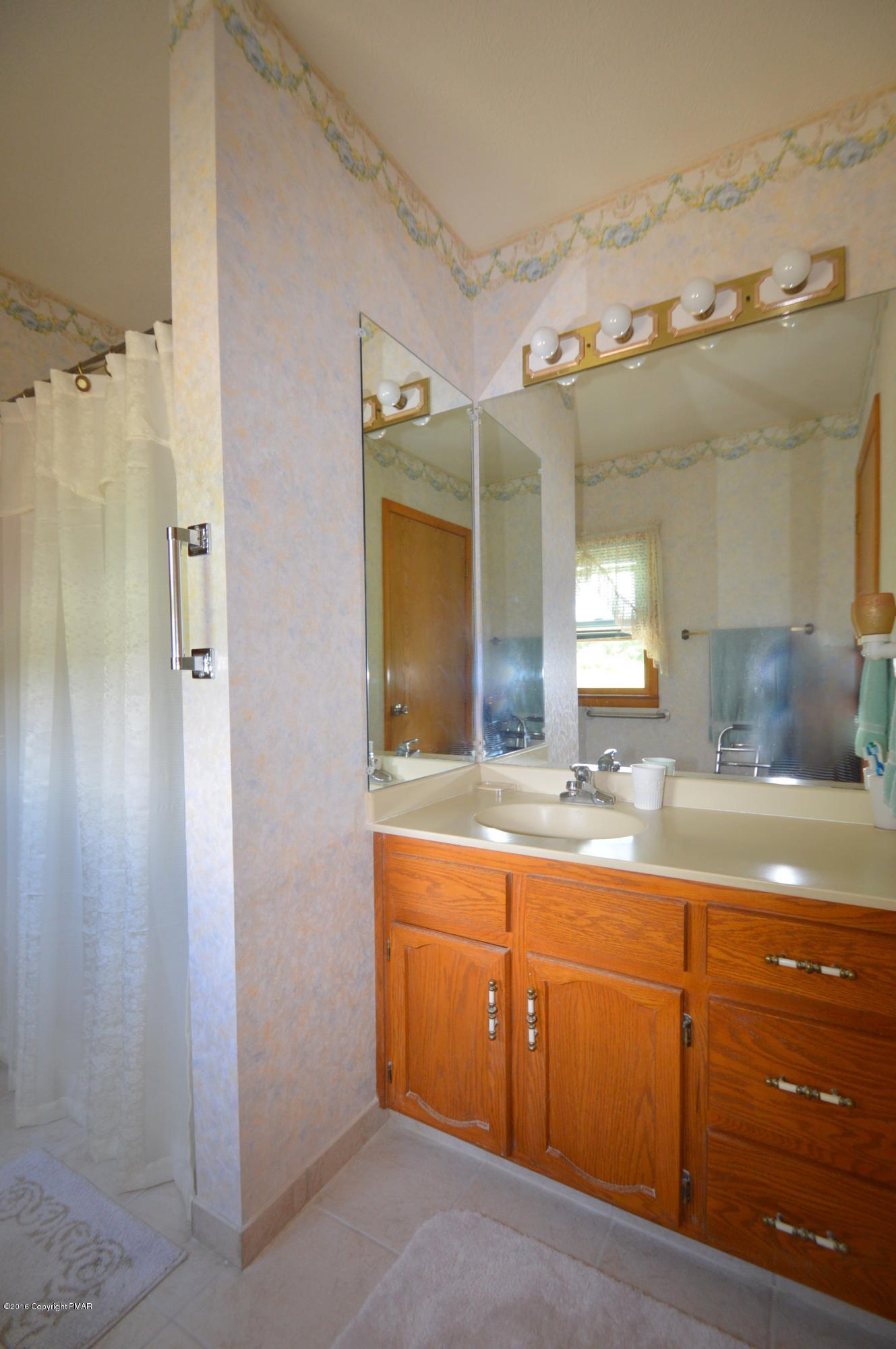 1109 Interchange Road Kunkletown, PA 18058 - Photo 10 of 23 a bathroom with a granite countertop sink mirror and shower