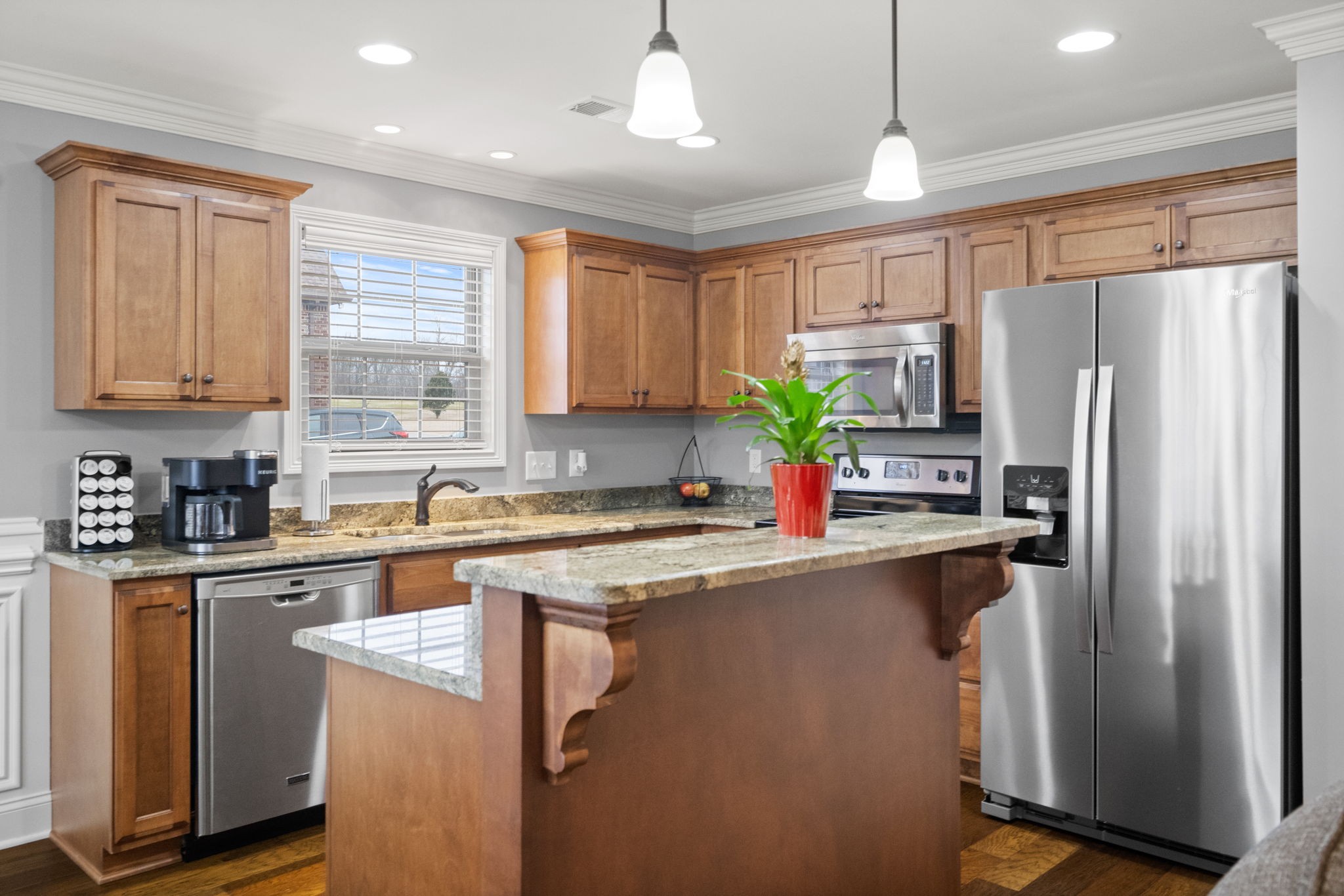 48 Harbor Pointe Lebanon, TN 37087 - Photo 11 of 28 a kitchen with stainless steel appliances granite countertop a refrigerator a sink a stove a refrigerator a center island and cabinets