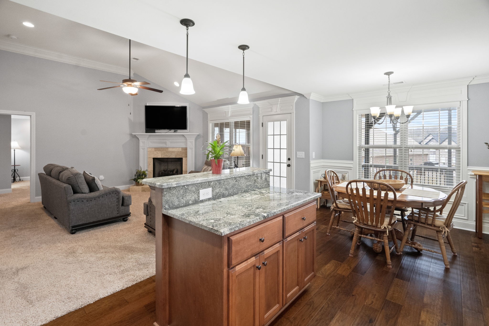 48 Harbor Pointe Lebanon, TN 37087 - Photo 13 of 28 a kitchen with stainless steel appliances kitchen island granite countertop a table chairs and a chandelier