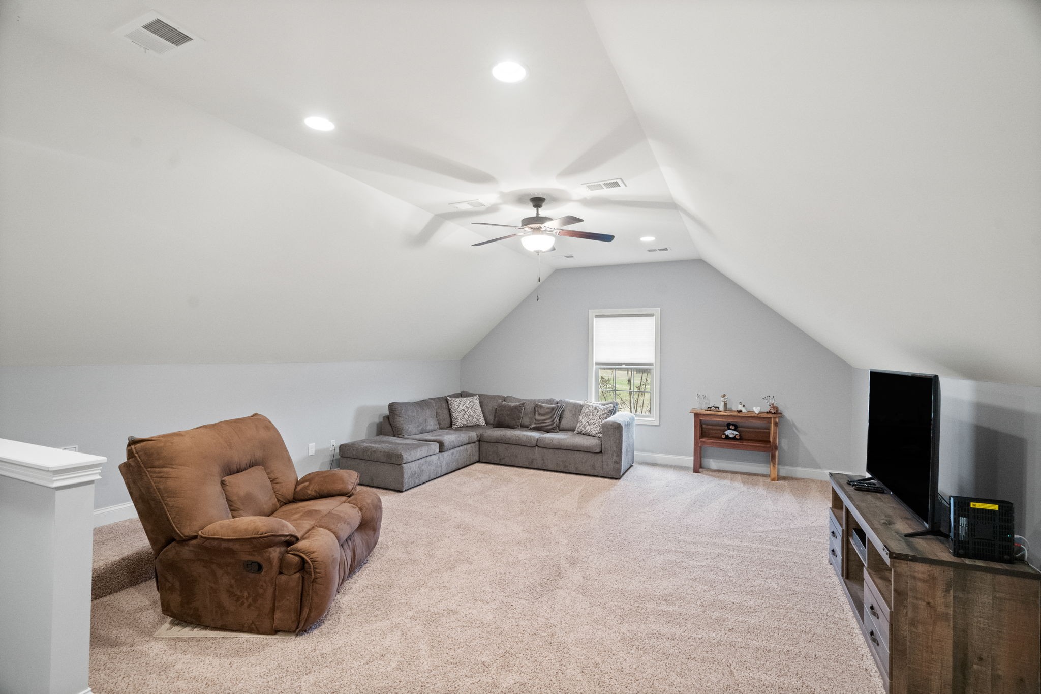 48 Harbor Pointe Lebanon, TN 37087 - Photo 20 of 28 a living room with furniture and a flat screen tv