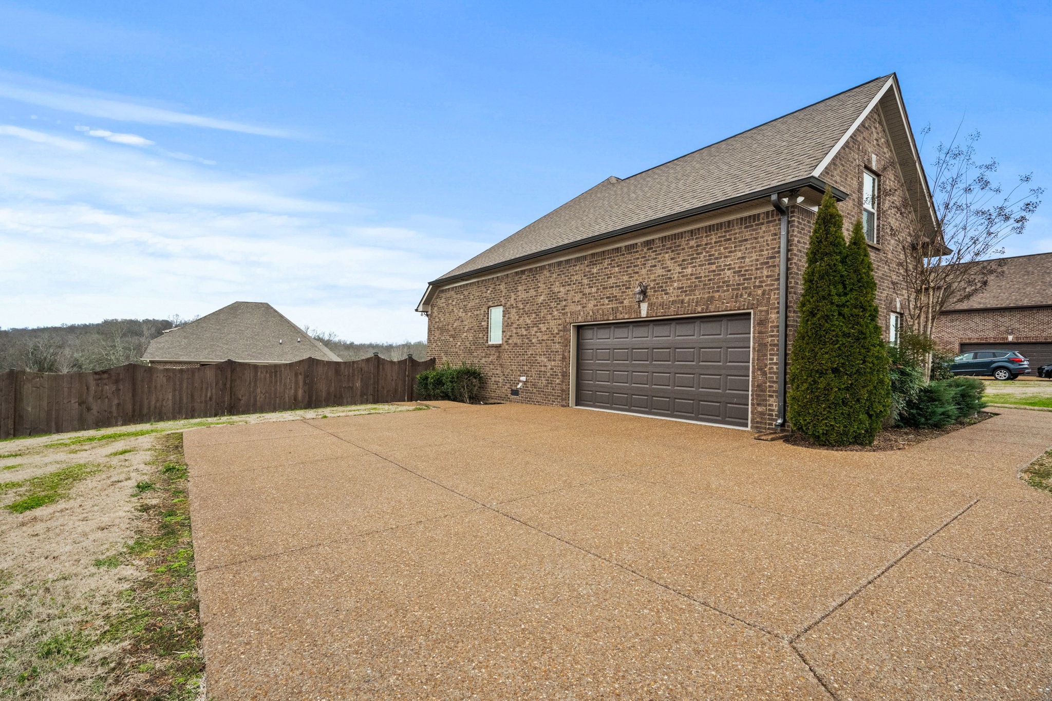 48 Harbor Pointe Lebanon, TN 37087 - Photo 4 of 28 a front view of house with yard and wooden fence