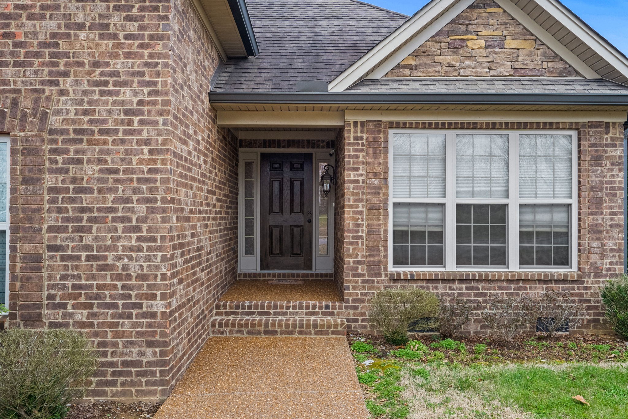 48 Harbor Pointe Lebanon, TN 37087 - Photo 6 of 28 a front view of a house with a garden