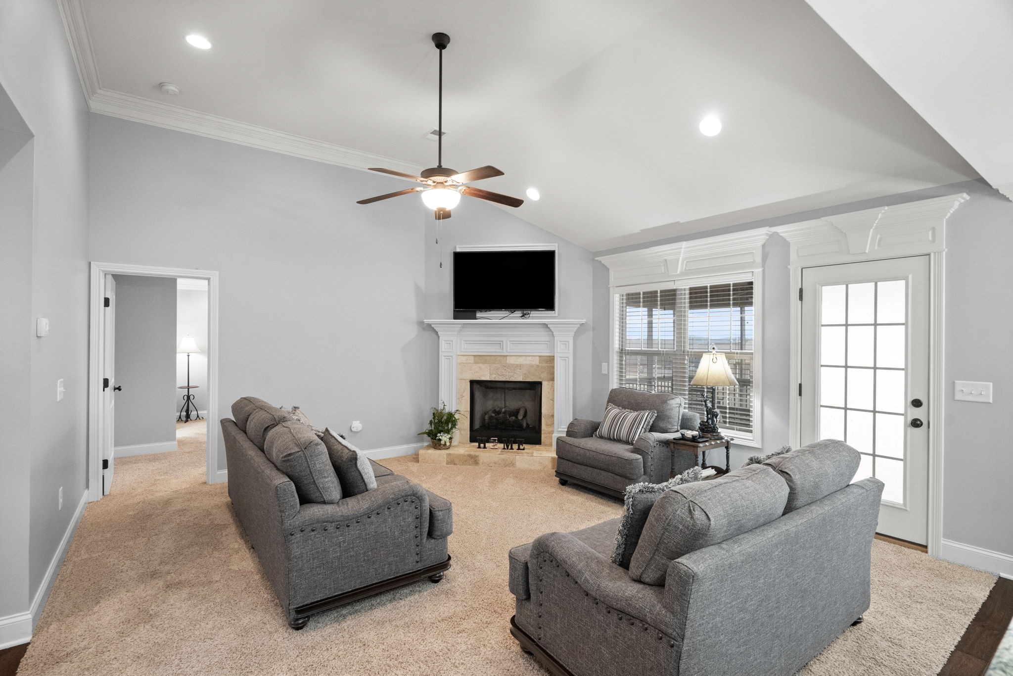 48 Harbor Pointe Lebanon, TN 37087 - Photo 8 of 28 a living room with furniture a fireplace and a flat screen tv