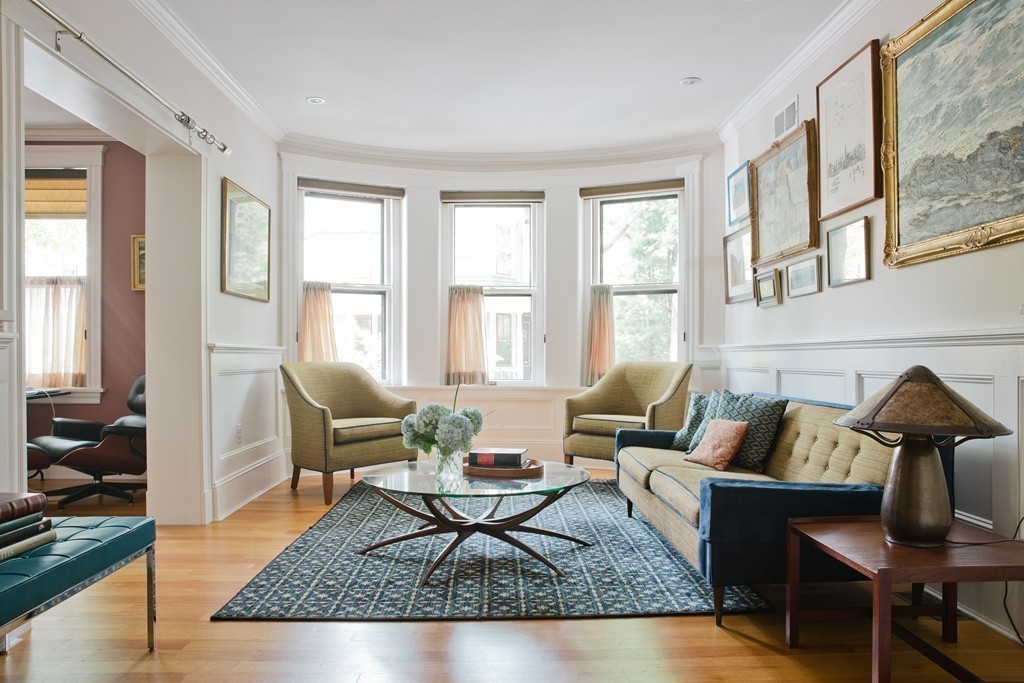 26 Hurlbut Street, Unit 2 Cambridge, MA 02138 - Photo 1 of 17 a living room with furniture rug and window