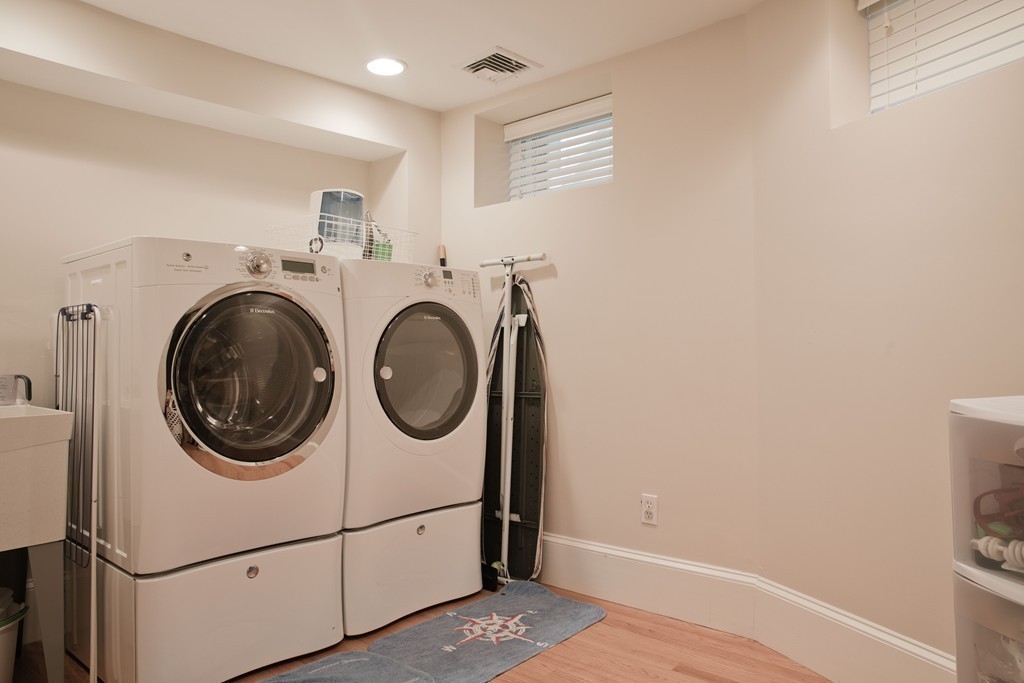 26 Hurlbut Street, Unit 2 Cambridge, MA 02138 - Photo 12 of 17 a utility room with dryer and washer