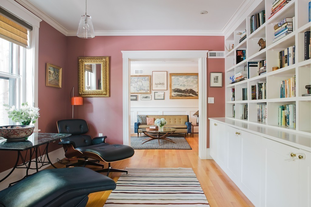 26 Hurlbut Street, Unit 2 Cambridge, MA 02138 - Photo 2 of 17 a living room with furniture and a book shelf