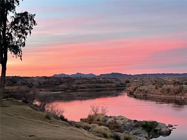 a view of lake and mountain
