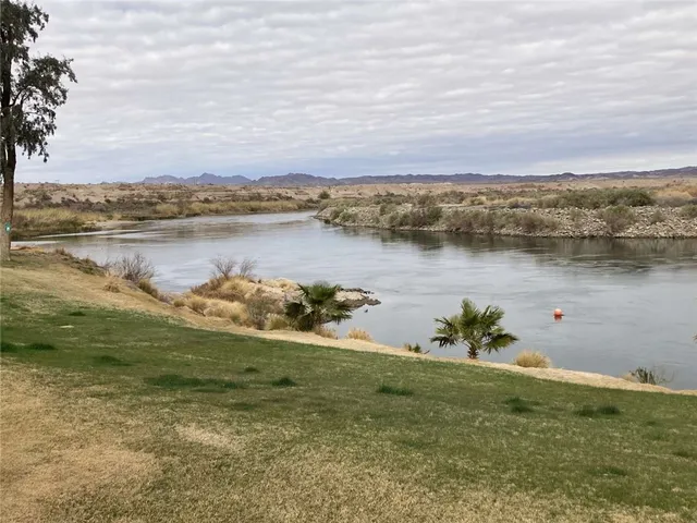a view of a lake with a city