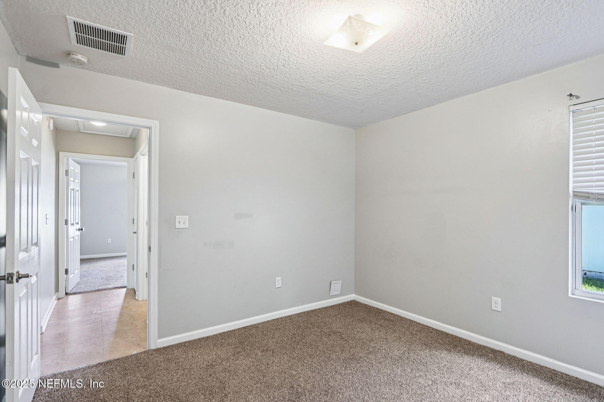 4054 Trail Ridge Road Middleburg, FL 32068 - Photo 25 of 48 wooden floor in an empty room
