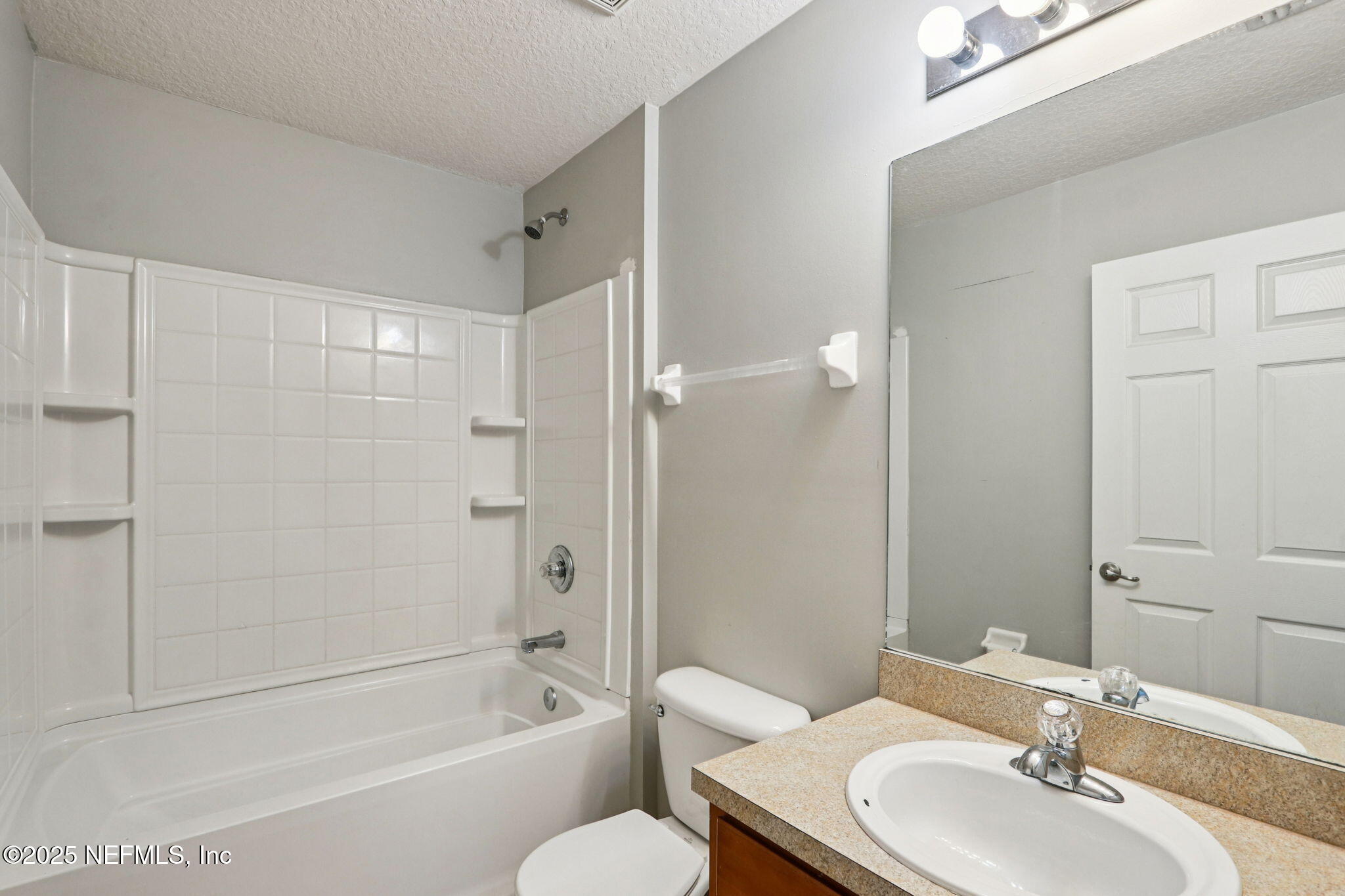 4054 Trail Ridge Road Middleburg, FL 32068 - Photo 26 of 48 a bathroom with a sink toilet and shower