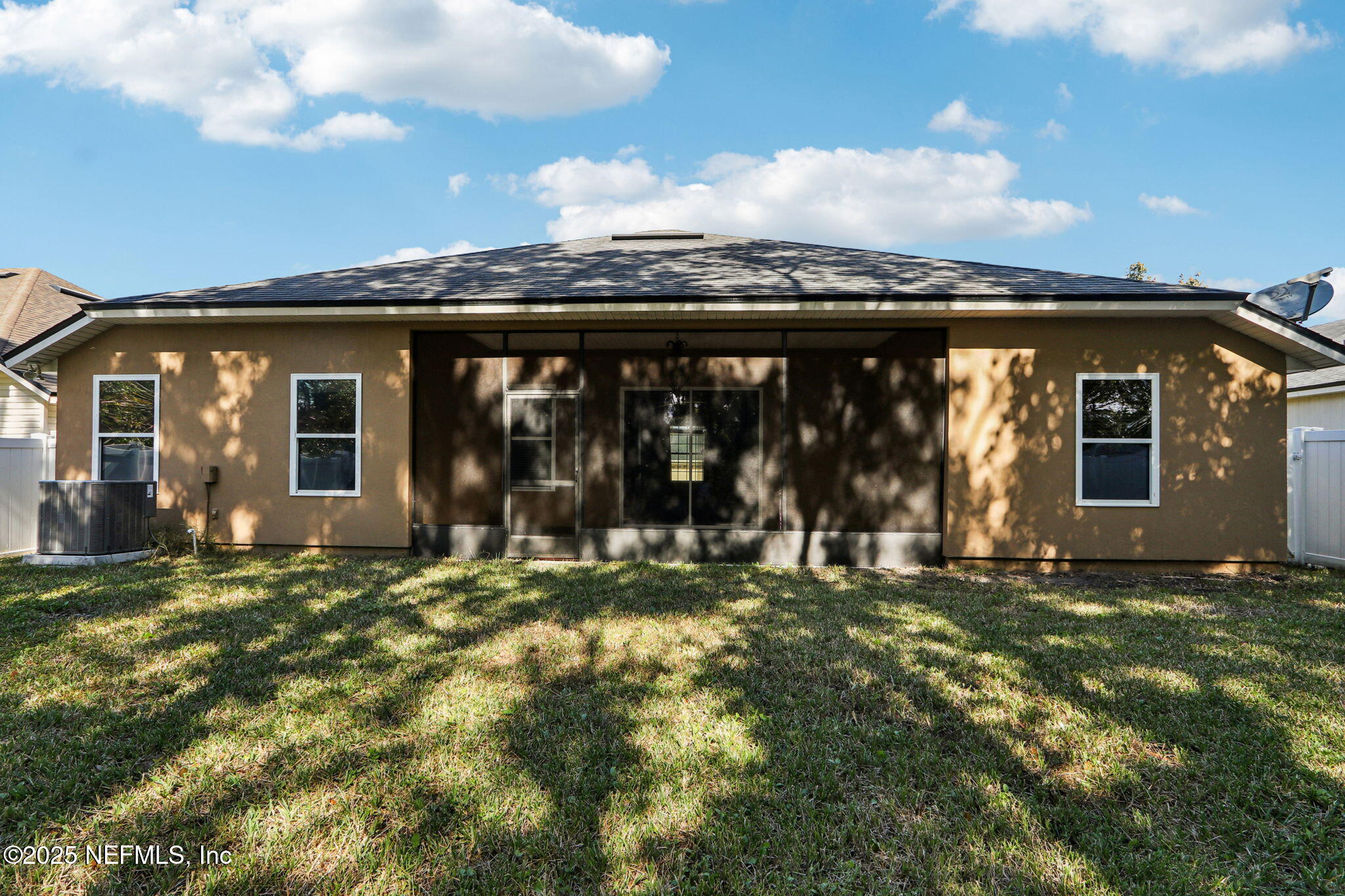 4054 Trail Ridge Road Middleburg, FL 32068 - Photo 30 of 48 a view of a house with backyard and porch