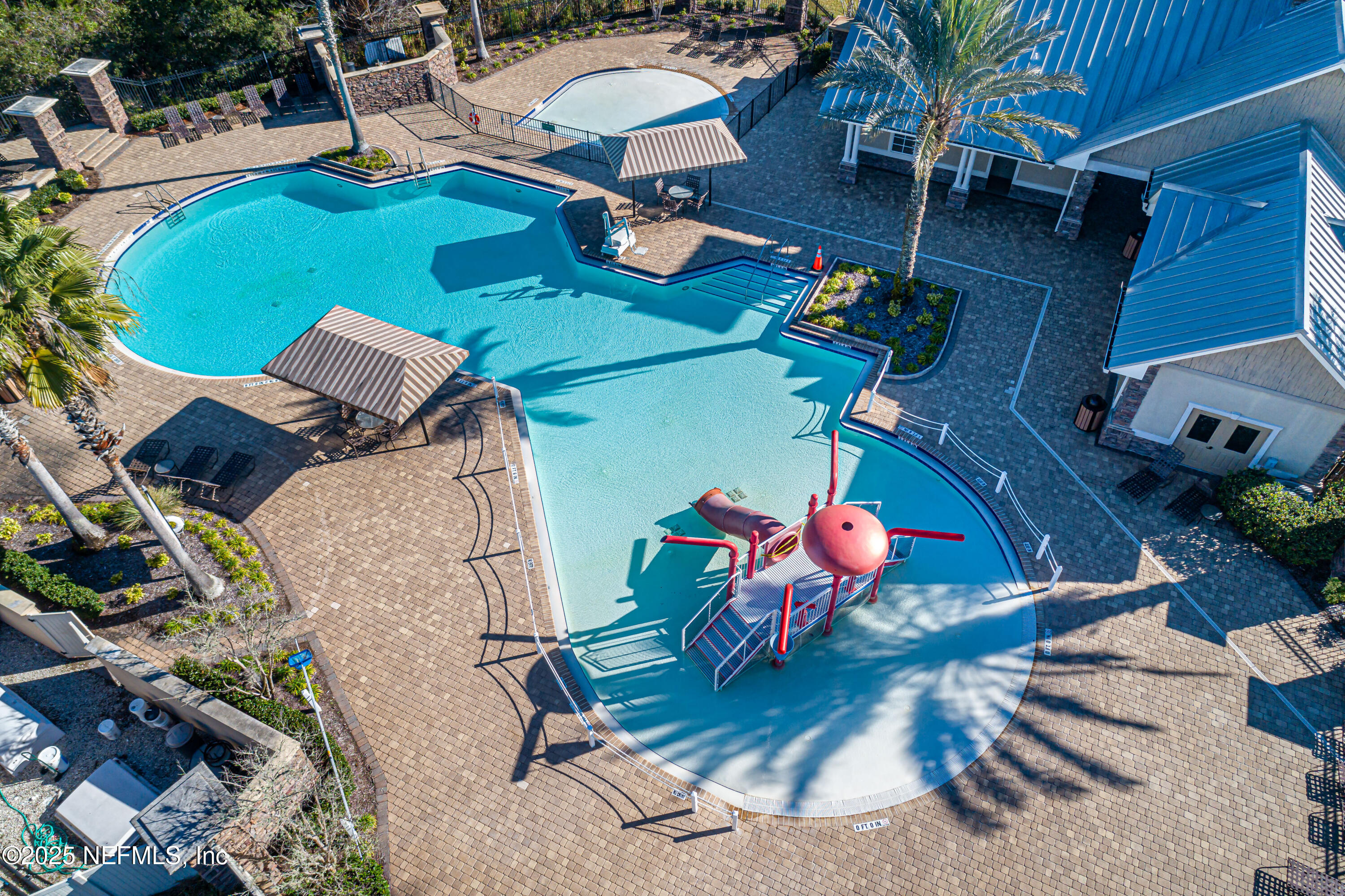 4054 Trail Ridge Road Middleburg, FL 32068 - Photo 36 of 48 an aerial view of a house with garden space and patio