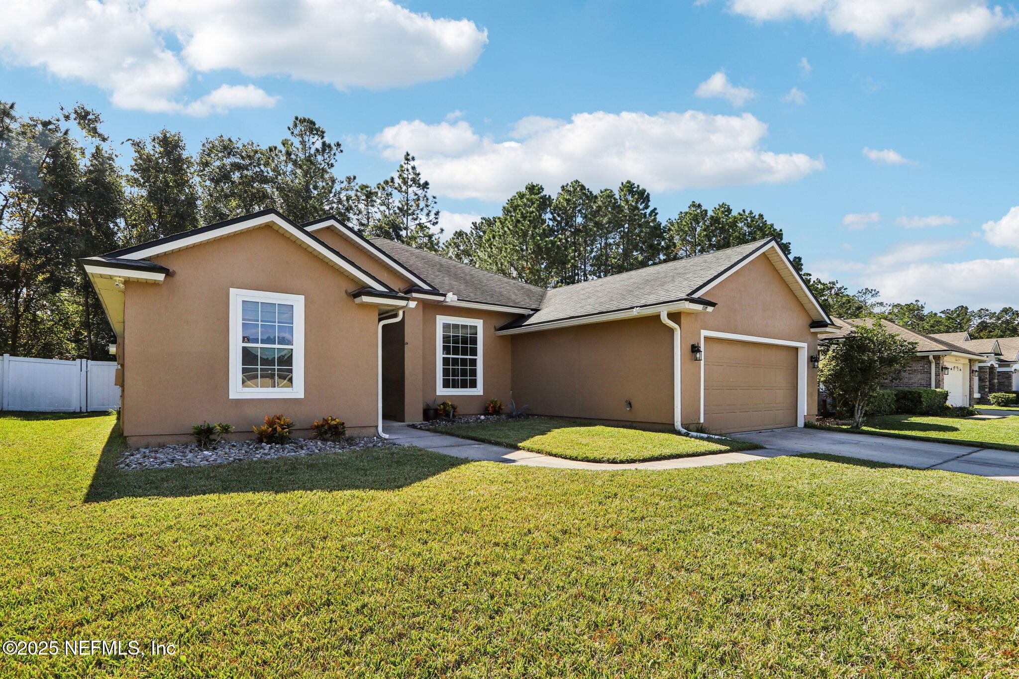 4054 Trail Ridge Road Middleburg, FL 32068 - Photo 42 of 48 a house with trees in the background