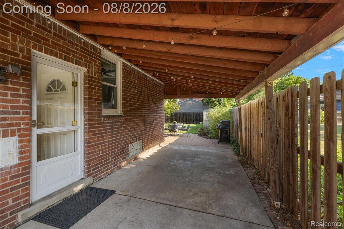 1150 West Eleven Mile Road Berkley, MI 48072 - Photo 24 of 29 Covered outdoor patio area featuring a concrete surface