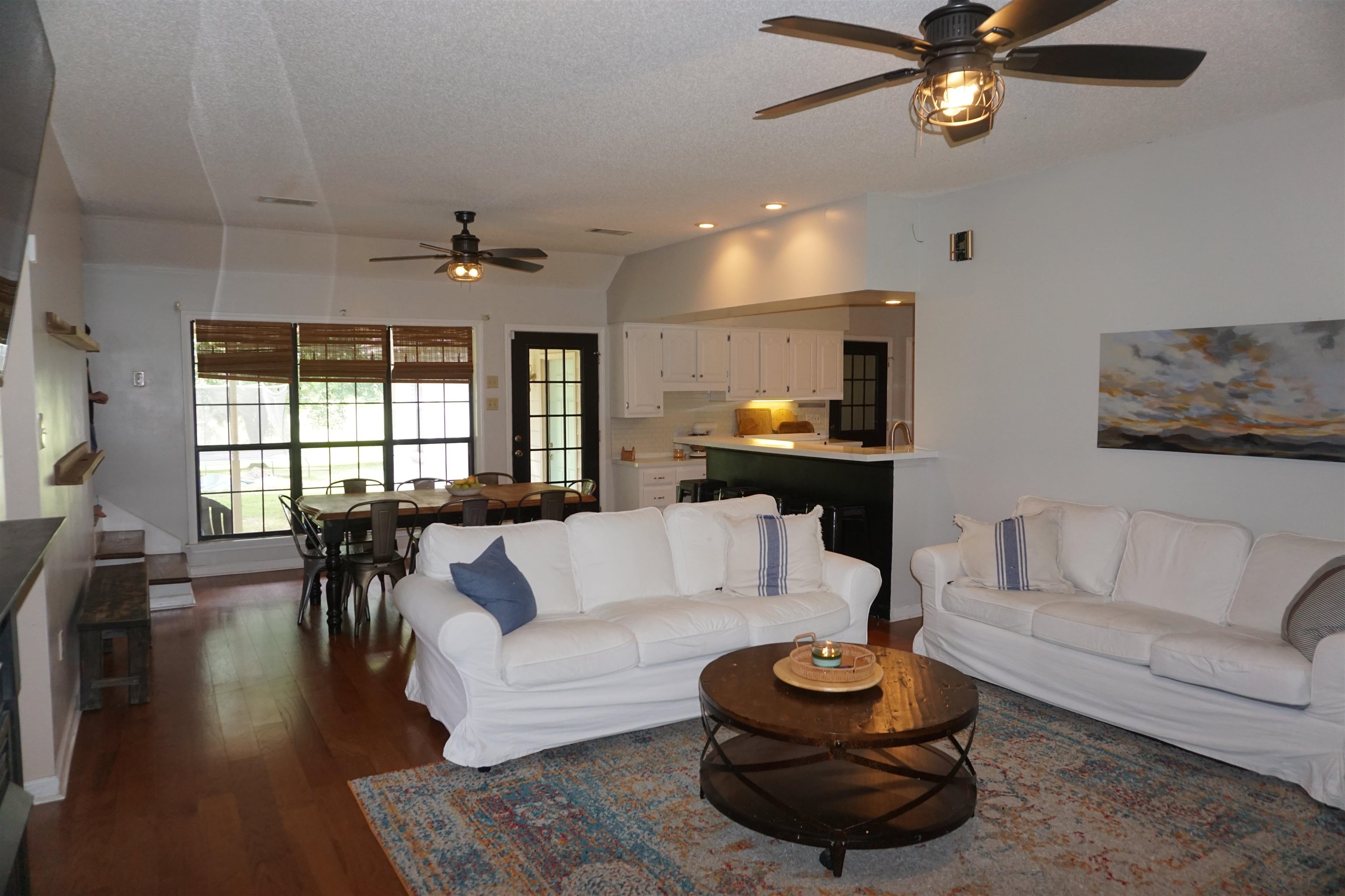 3780 Meade Lake Road Millington, TN 38053 - Photo 14 of 40 Living area with a ceiling fan, a textured ceiling, dark wood-style floors, vaulted ceiling, and recessed lighting