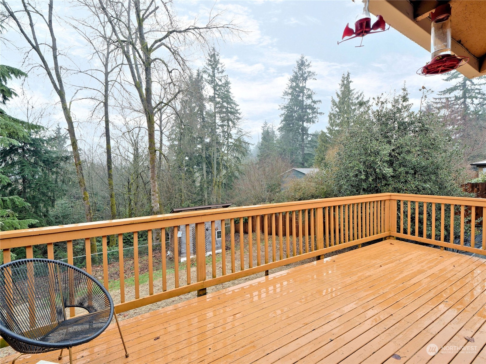 11261 145th Avenue Southeast Renton, WA 98059 - Photo 11 of 26 a view of balcony with staircase and wooden floor