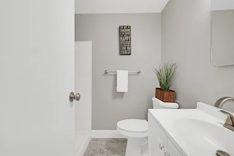 a view of outdoor space with deck and tree