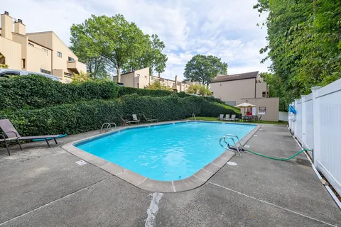 an aerial view of a house with a garden