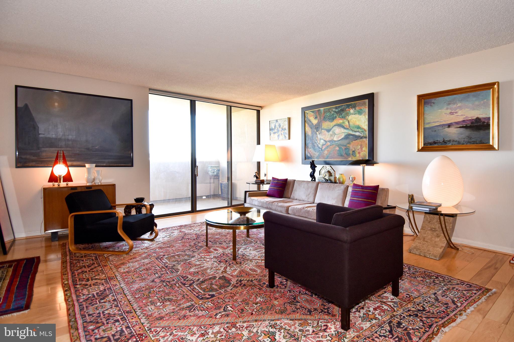 1101 South Arlington Ridge Road, Unit 903 Arlington, VA 22202 - Photo 7 of 66 Living Room with Glass Doors to the Balcony