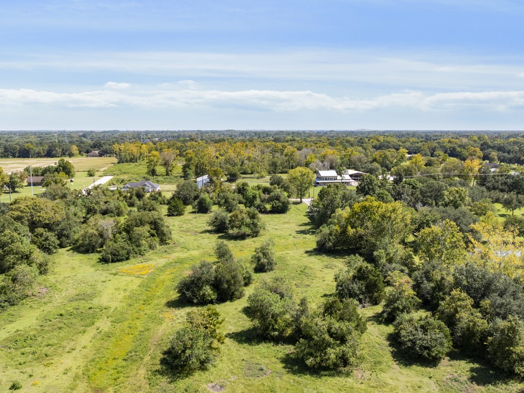 0 Tower Road Santa Fe, TX 77517 - Photo 26 of 45 an aerial view of residential houses with outdoor space and trees