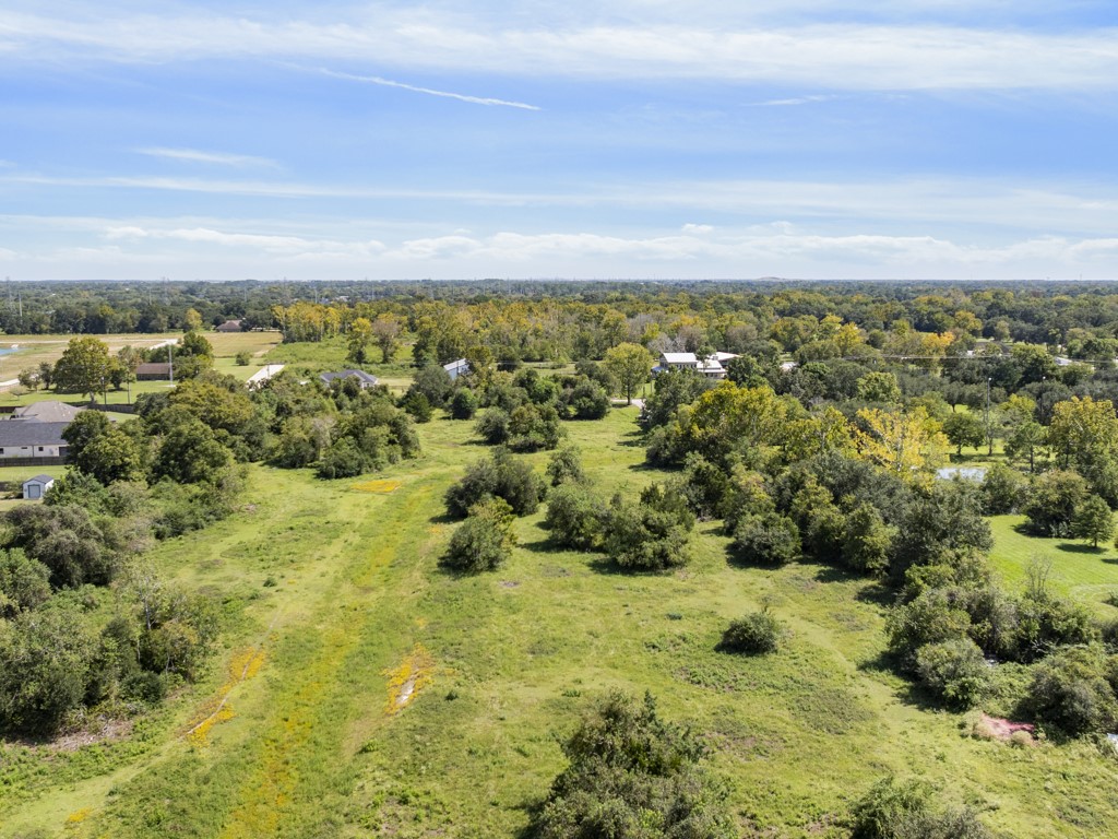 0 Tower Road Santa Fe, TX 77517 - Photo 27 of 45 an aerial view of residential houses with outdoor space and trees