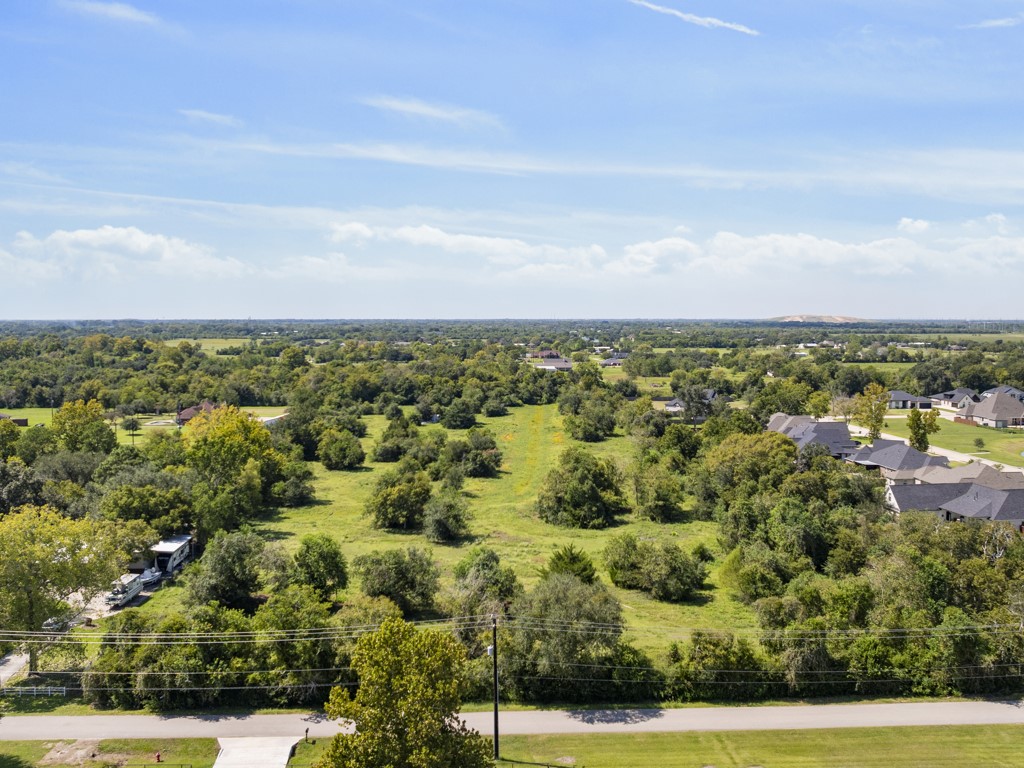 0 Tower Road Santa Fe, TX 77517 - Photo 37 of 45 an aerial view of residential houses with outdoor space and trees