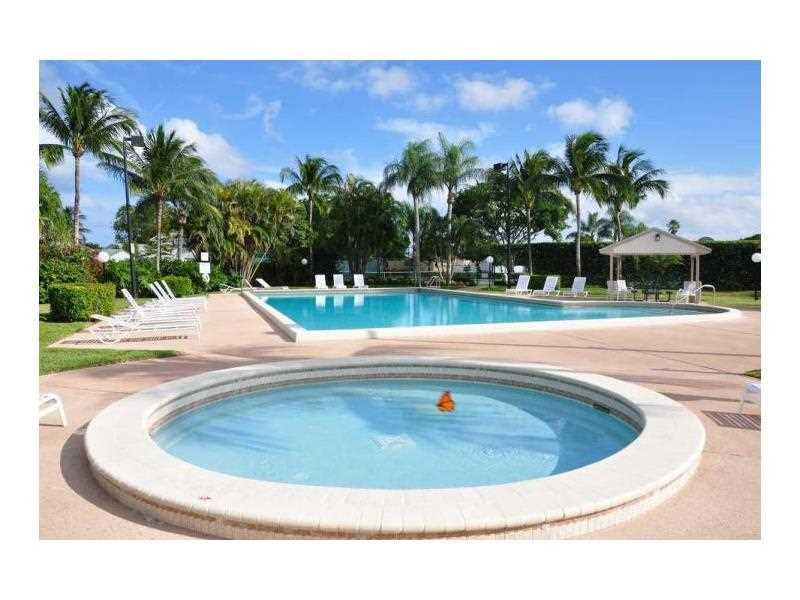 23279 New Coach Way Boca Raton, FL 33433 - Photo 15 of 16 a view of swimming pool with a yard