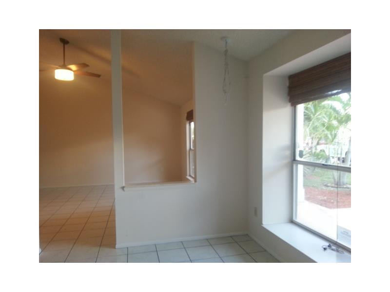 23279 New Coach Way Boca Raton, FL 33433 - Photo 4 of 16 a bathroom with a sink and a mirror