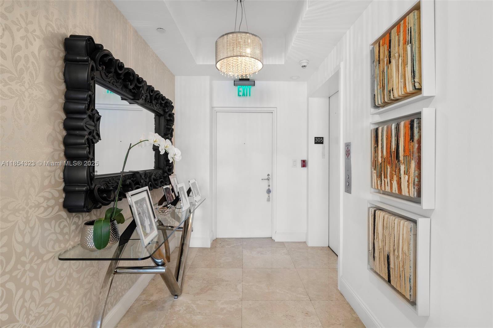 723 Crandon Boulevard, Unit 305 Key Biscayne, FL 33149 - Photo 29 of 29 a view of a room with gym equipment