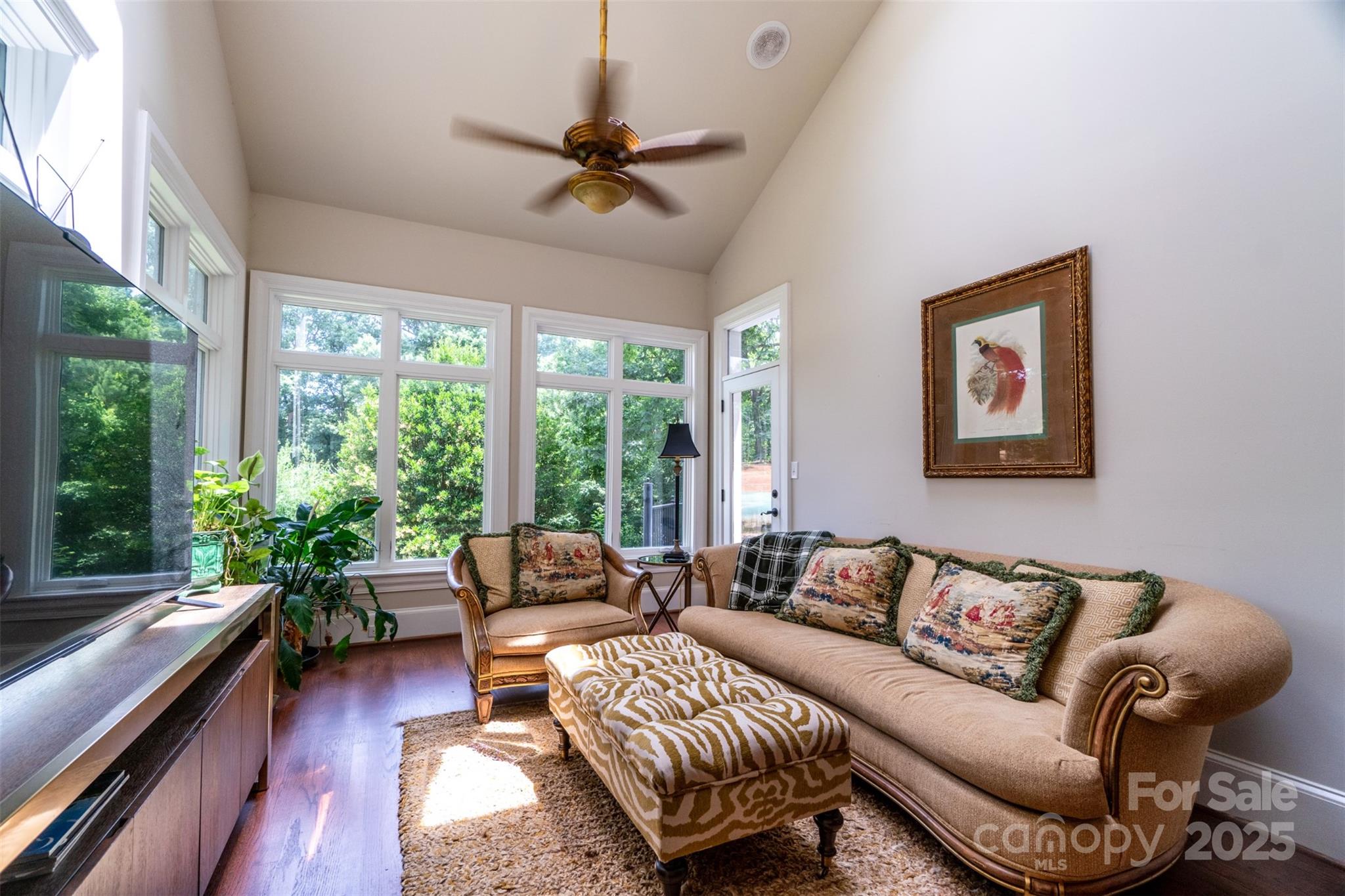 19002 Meta Road Cornelius, NC 28031 - Photo 12 of 48 a living room with furniture and a large window