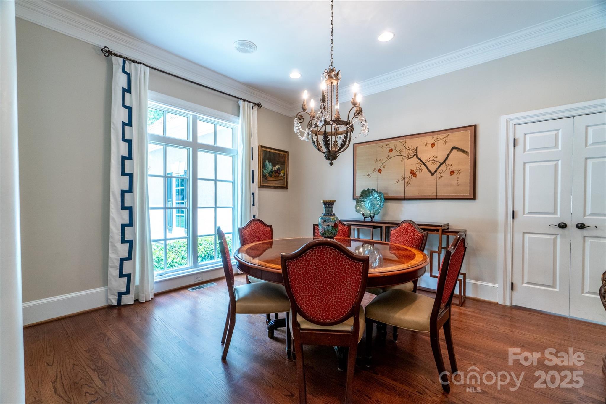 19002 Meta Road Cornelius, NC 28031 - Photo 13 of 48 a view of a dining room with furniture window and wooden floor
