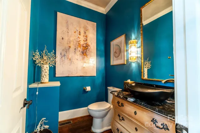 a bathroom with a toilet and a sink