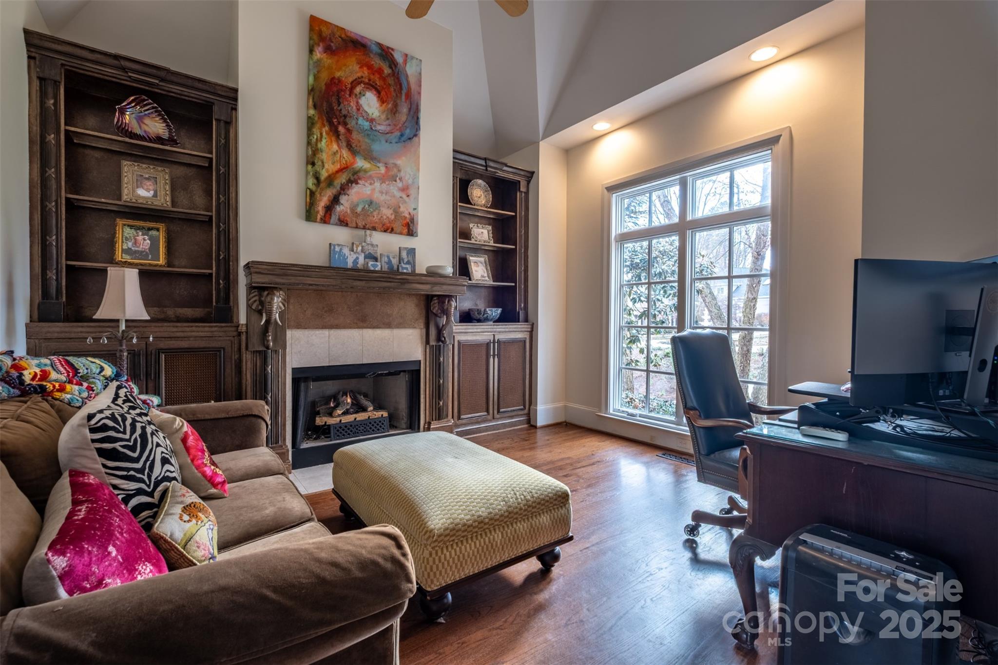 19002 Meta Road Cornelius, NC 28031 - Photo 17 of 48 a living room with furniture and a fireplace