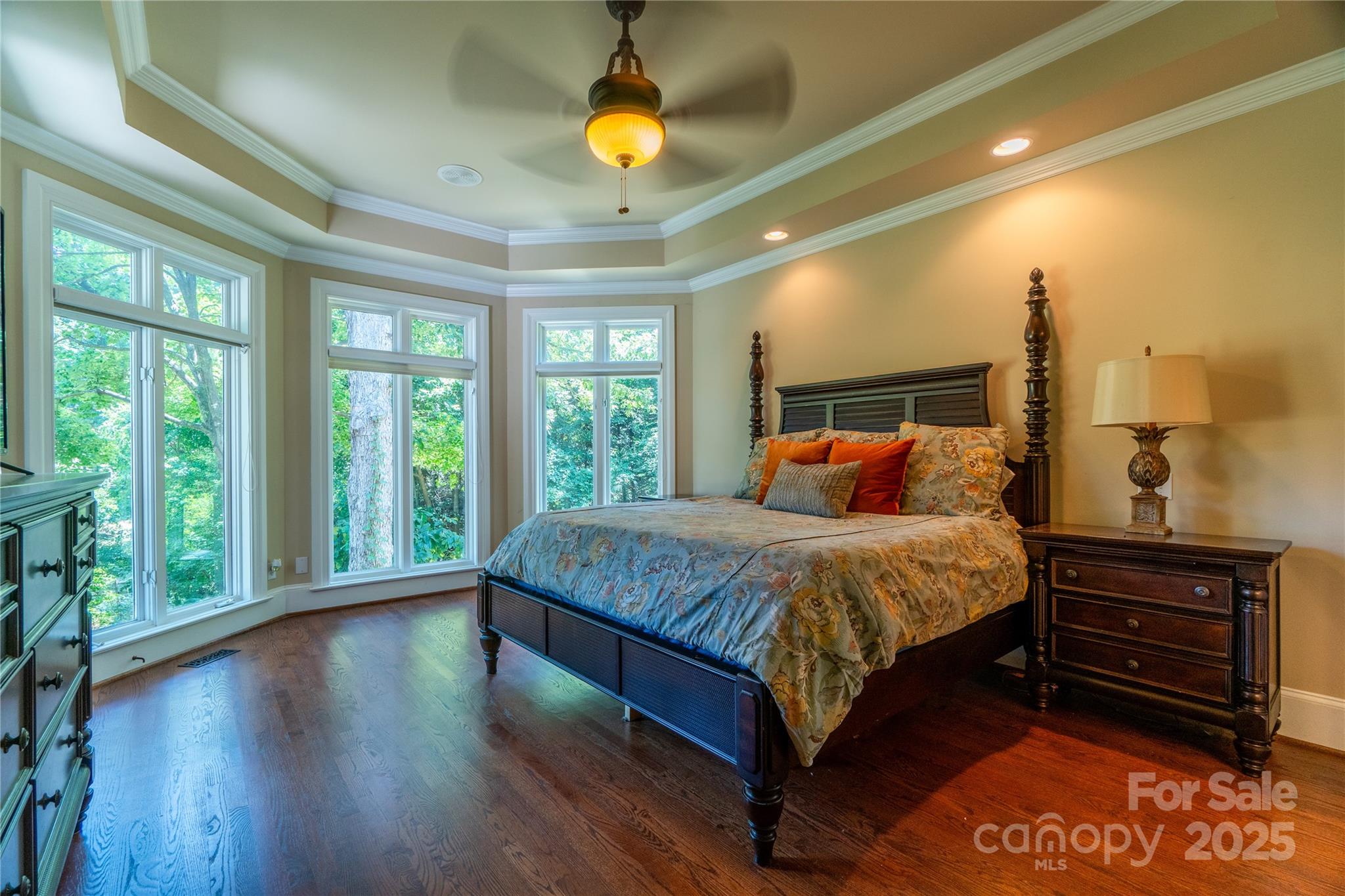 19002 Meta Road Cornelius, NC 28031 - Photo 19 of 48 a bed sitting in a spacious bedroom next to a window