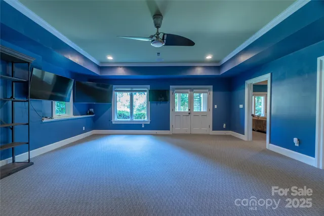 a view of empty room with windows