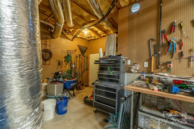 a view of a patio with storage and utility