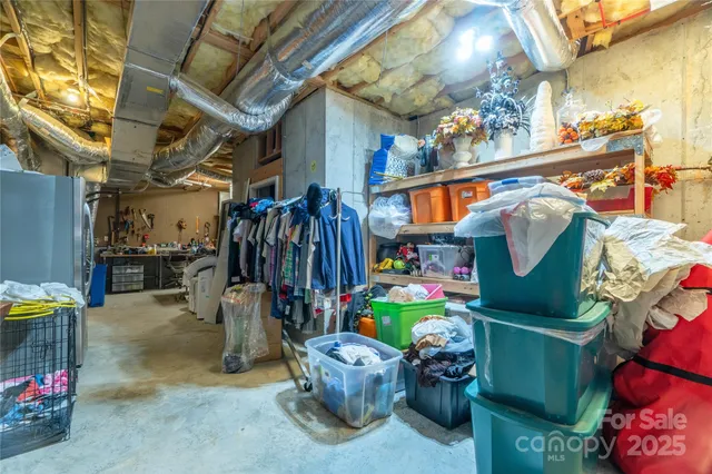 a room with lots of different furniture and clutter